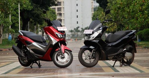 Nmax Vs Pcx Lokal. Yamaha NMAX Vs. Honda PCX, Laris Mana di Pasar Otomotif Lokal